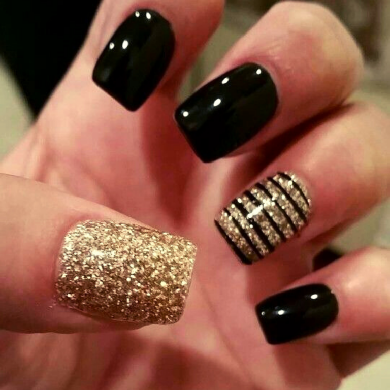 Black Glitter nails with gold accents